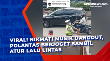 Viral! Nikmati Musik Dangdut, Polantas Berjoget Sambil Atur Lalu Lintas