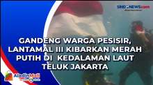 Gandeng Warga Pesisir, Lantamal III Kibarkan Merah Putih di Kedalaman Laut Teluk Jakarta