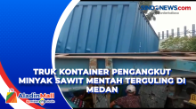Truk Kontainer Pengangkut Minyak Sawit Mentah Terguling di Medan