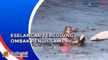 Peselancar Asing Tergulung Ombak Penuh Sampah di Pantai Batu Bolong Bali