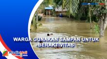 Ribuan Rumah di Langkat Terendam Banjir, untuk Beraktivitas Warga Gunakan Sampan