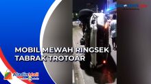 Tabrak Trotoar, Mobil Mewah Terguling di Tambora