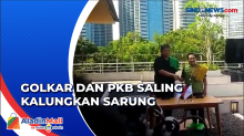 Ketum Golkar dan Ketum PKB Saling Kalungkan Sarung Hijau Kuning di Istora Senayan, Pertanda Koalisi?