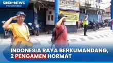 Warga dan Pengamen Ikut Hormat di Simpang Empat Jambi saat Indonesia Raya Berkumandang