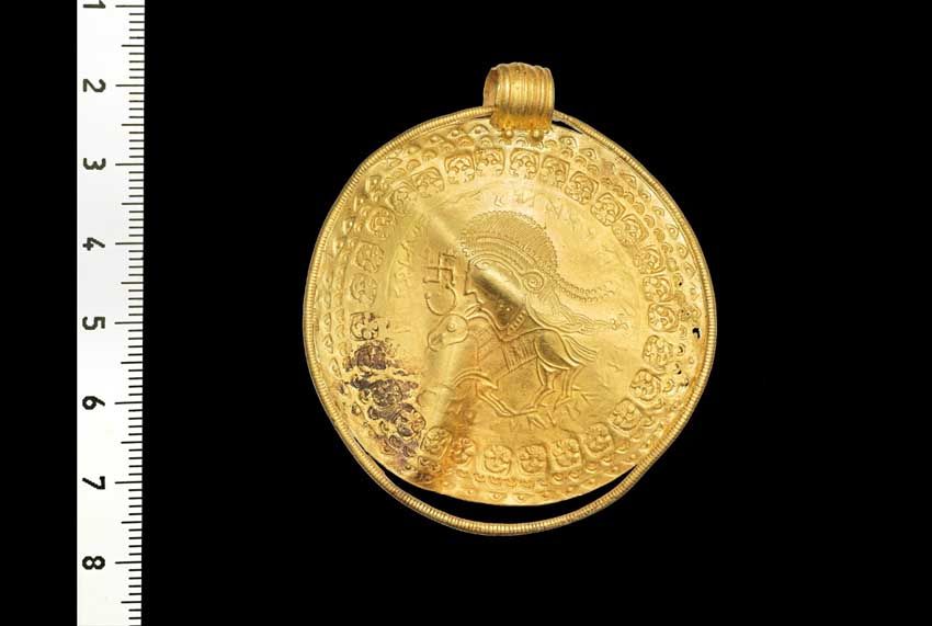 Danish treasure, found gold pendant of the god Odin