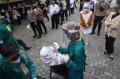 Ratusan Warga dan Polisi Ikuti Rapid Test Antigen Gratis HUT Dokkes Polri dan Bhayangkara ke-75