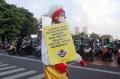 Aksi Komunitas Aku Badut Indonesia Kampanyekan Pakai Masker