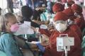 Vaksinasi Massal di Terminal Pulogebang