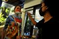 Sambut HUT RI, Seniman Bali Lukis Tubuh Model dengan Tema Perjuangan