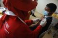 Vaksinasi Massal Pelajar di Palembang