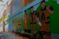Warna-warni Hiasan Mural Bertemakan Kota Jakarta di Tanah Kusir