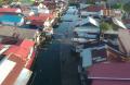 Banjir Rob Genangi Permukiman Warga di Kota Padang