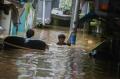 Banjir Setinggi 2 Meter Rendam Permukiman Warga di Kebon Pala Jaktim