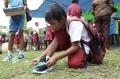 Kontribusi Pelari MAIR 2022 Berikan Seribu Sepatu untuk Anak Indonesia