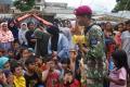 Melihat Kedekatan Prajurit TNI AL dengan Masyarakat di Lokasi Terdampak Bencana Gempa Cianjur