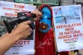 Aksi Unjuk Rasa Tuntut Kedaulatan Perairan Natuna dan Boikot Olimpiade Musim Dingin 2022