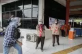 Begini Aksi Anggota Pramuka Bantu Amankan Arus Mudik di Terminal Kampung Rambutan