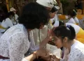 Tradisi Metatah di Pura Agung Giri Natha Semarang