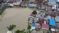 Banjir Akibat Luapan Sungai Palu Rendam Permukiman Warga