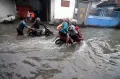 Banjir Rendam Permukiman Warga di Desa Kureksari Sidoarjo