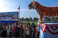 Potret Keseruan Warga Palembang Menyaksikan Karnaval Mobil Hias HUT Sumsel ke-77