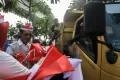 Potret Gerakan Pembagian 10 Juta Bendera Merah Putih di Palembang