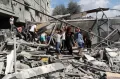 Israel Hancurkan Rumah dan Bantai Warga Sipil Palestina di Kota Rafah