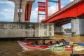 Potret Suasana Arus Mudik di Dermaga Jembatan Ampera Palembang