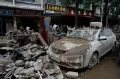 Luluh Lantak Pertokoan Akibat Terjangan Banjir di Pingjiang Cina