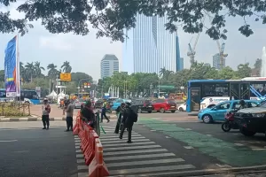Hindari Penumpukan Kendaraan, Polisi Tutup Jalan Medan Merdeka Barat